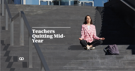 teacher quitting mid year sitting and meditating on the steps outside of a building